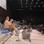 Juneau band The Breeze, made up of Charles Kiel Renick, Olivia Sinaiko and Bob Sinaiko, prepare to play their set at Centennial Hall during the 2022 Alaska Folk Fest on April 4, 2022. This years festival takes place on April 10-16. (Michael S. Lockett / Juneau Empire file)