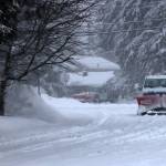 Plows work to clear Mendenhall Valley streets on Wednesday. (Ben Hohenstatt / Juneau Empire)
