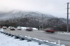 Cars zoom across the downtown bridge connecting Juneau to Douglas Island. Thursday evening the City and Borough of Juneau Public Works and Facilities Committee hosted an open forum meeting to discuss a proposed second crossing from Juneau to Douglas Island. (Clarise Larson / Juneau Empire)
