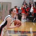 Jonson Kuhn / Juneau Empire
JDHS freshman Gwen Nizich looks for an open pass down court on Thursday nights game against TMHS. Nizich led the Crimson Bears in scoring for a total of 13 points.