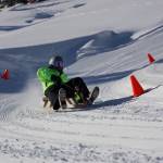 Doug Sanvik rips down a hill on a luge at Eaglecrest Ski Area Saturday morning. (Clarise Larson / Juneau Empire)