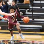 Ketchikans JJ Parker takes the ball down court against JDHS in a conference game earlier this season. The two teams are set to face off again for this years Region V Tournament. (Jonson Kuhn / Juneau Empire)