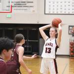 JDHS senior Skylar Tuckwood looks for an open pass against Ketchikan in a conference game from earlier this season. (Jonson Kuhn / Juneau Empire)