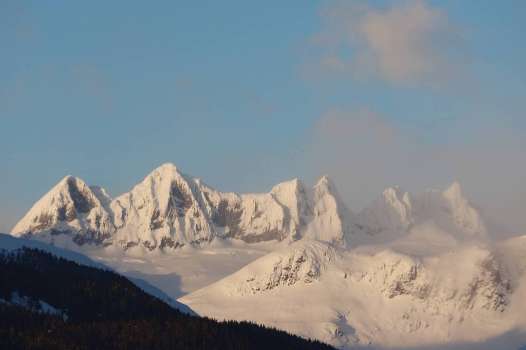 Clarise Larson / Juneau Empire 
Clouds pass by near the Mendenhall Towers early Tuesday evening.