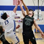 Metlakatlas Cameron Gaube (13) and Aaron OBrien battle for a rebound with Haines Luke Davis (2) and Eric Brouilette (40) during the Region V tournament on Thursday. (Klas Stolpe / For the Juneau Empire)