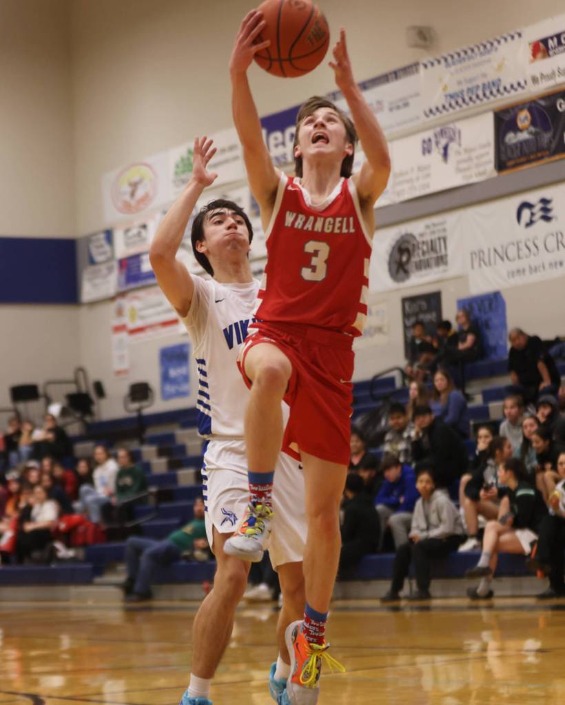 Wrangell senior Devlyn Campball (3) rises for a layup against Petersburg in the first half of a 1-point loss. (Ben Hohenstatt / Juneau Empire)
