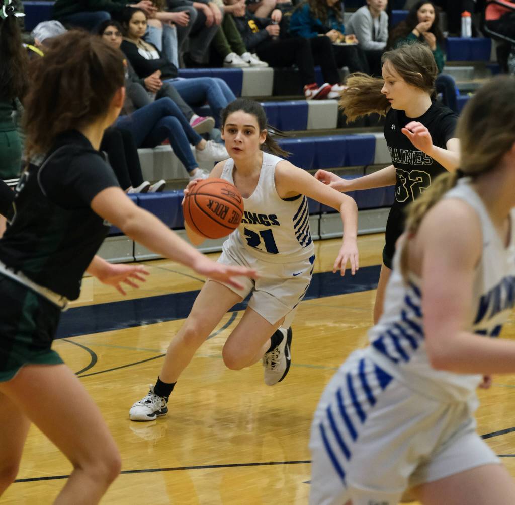 Petersburgs Cadence Lopez drives against Haines during the Region V tournament on Thursday. (Klas Stolpe / For the Juneau Empire)