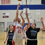 Wrangell High School junior Kayla Meissner (23) Petersburg High School sophomore Kylie Mattingly (30) during the Lady Wolves 48-10 win over the Lady Vikings in the Region V 2A/4A Basketball Tournament on Wednesday at Thunder Mountain High School in Juneau. (Klas Stolpe for the Juneau Empire)