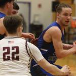 TMHS junior Thomas Baxter plots his next move during the Falcons first game of the Region V 4A Tournament at Thunder Mountain High School. Kayhi prevailed in a close game. Next up for Kayhi, are the conference-leading Crimson Bears. (Jonson Kuhn / Juneau Empire)