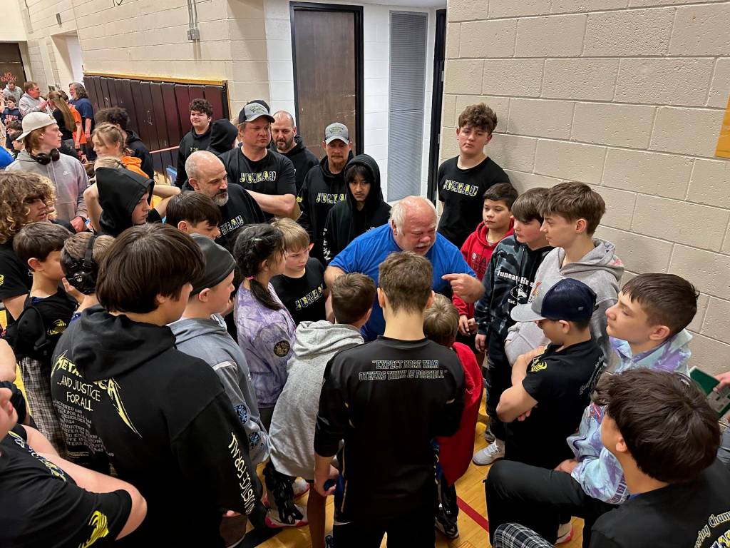 Coach Cummins fires up members of the Juneau Youth Wrestling Club at the 47th annual Tanana Middle School Invitational in Fairbanks March 3-4. (Courtesy Photo / Eva Carrillo)