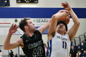 Haines senior Eric Brouilette (40) blocks a shot by Metlakatla senior TJ Jackson (11) during the Region V 2A/4A Basketball Tournament on Thursday at Thunder Mountain High School in Juneau. (Klas Stolpe / For the Juneau Empire)