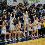 Metlakatla MisChiefs players celebrate a made basket during their 47-18 win over the Craig Lady Panthers in the 2A Region V Championship Game at Juneaus Thunder Mountain High School on Friday. (Klas Stolpe / For the Juneau Empire)