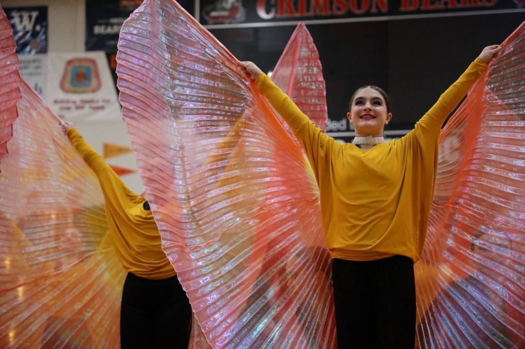 JDHS dance team members manage elaborate wardrobe changes with ease during their Hollywood themed performance during the annual Region V 2A/4A dance adjudication competition hosted at Juneau-Douglas High School:Yadaa.at Kalé Saturday afternoon. (Clarise Larson / Juneau Empire)