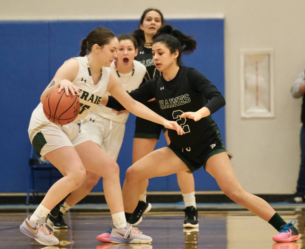 Haines senior Grace Long Godinez (2) defends Craig senior Alissa Durgan (15) during the Lady Glacier Bears 45-35 win over the Lady Panthers in the 2A Region V Runner Up game on Saturday at Juneaus Thunder Mountain High School. (Klas Stolpe / For the Juneau Empire)