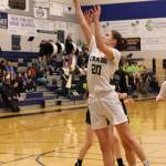 Craig senior Laci Lowery (20) shoots early in an elimination game against Haines. (Ben Hohenstatt / Juneau Empire)