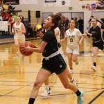 Haines sophomore Ariel Godinez Long (3) leads the pack down the court on her way to putting 2 points on the board in a game against Craig that secured the Lady Glacier Bears a trip to state. (Ben Hohenstatt / Juneau Empire)