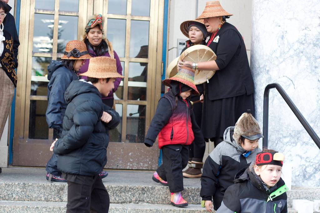 The Woosh.ji.een Dance Group performs on the steps of the Alaska State Capitol on Tuesday evening. (Mark Sabbatini / Juneau Empire)