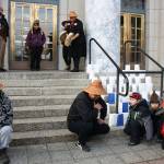 The Woosh.ji.een Dance Group performs amongst 220 candles in paper bags on the steps of the Alaska State Capitol on Tuesday evening during a vigil to recognize residents who have died by suicide. The candles represent each of the 220 suicides in 2021, with the blue bags representing people who served in the military. (Mark Sabbatini / Juneau Empire)