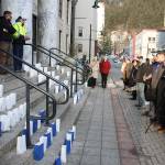 A small crowd gathers outside the Alaska State Capitol on Tuesday evening for an annual vigil recognizing residents who have died from suicide. Alaska has one of the highest rates of suicide in the United States. (Mark Sabbatini / Juneau Empire)