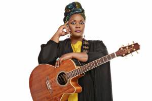 Courtesy Photo / Nora Canfield
Nashville-based singer-songwriter Kyshona Armstrong, who performs music under just her first name, poses for a photo with her guitar. Kyshona will be performing at the Crystal Saloon and 7 p.m. on Wednesday with her bandmates Nickie Conley and Shannon LaBrie.