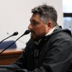 Clarise Larson / Juneau Empire 
Dustin Morris, Alaska area director for the American Foundation for Suicide Prevention, speaks to the state House Health and Social Services Committee Thursday afternoon in support of a bill that would ban licensed practitioners from providing conversion treatment to minors or vulnerable adults in the state of Alaska.