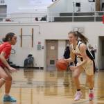 Skylar Tuckwood takes the ball down court against Anchorage Christian School on Friday, Dec. 30 where she led her team for a total of 23 points. (Jonson Kuhn / Juneau Empire)