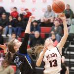 Skylar Tuckwood shoots an easy shot against TMHS on Thursday, March 2, during the Region V tournament at JDHS. Tuckwood finished the game with a total of 12 points. (Jonson Kuhn / Juneau Empire file )