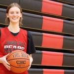 JDHS senior and team captain Skylar Tuckwood poses for a photo during a practice ahead of the Region V Tournament. Though the Crimson Bears were eliminated, the team secured an at-large bid to enter into the state championship this year in Anchorage. (Jonson Kuhn / Juneau Empire)
