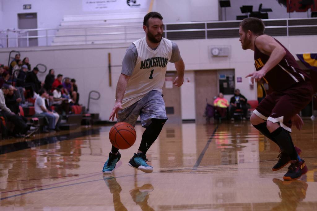 Yakutats Adam Jonson (1) drives to the hoop in the second half of a close loss to Klukwan. Johnson finished the game with 19 points. (Ben Hohenstatt / Juneau Empire)