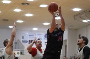Hoonas Travis Dybdahl shoots a layup against Angoon Sunday night during the Gold Medal Basketball Tournament at JDHS. Dybdahl led his team with 32 points (Jonson Kuhn / Juneau Empire)
