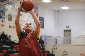 Juneaus Ed Mercer (7) puts up a shot against Sitka Monday morning during this years Gold Medal basketball tournament at JDHS. Mercer finished the game with 6 points. (Jonson Kuhn / Juneau Empire)