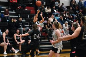 Prince of Wales Cassi Williams hits one of her five three point shots in POWs win over Sitka at the Gold Medal tournament, Tuesday, March 21, in the Juneau-Douglas High School: Yadaa.at Kalé gymnasium.