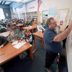 Abel Ryan leads classes in sketching a killer whale on the final day of class. (Courtesy Photo / David Sheakley-Early)