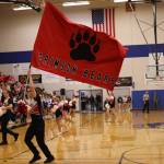 JDHS cheer team leads crowd in chant for the opening of a Crimson Bears Region V basketball game. Winning that tournament sent the JDHS boys to state in Anchorage. They played against top-seeded West Valley High School on Wednesday, losing 60-37 (Ben Hohenstatt / Juneau Empire File)