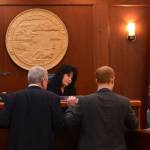 From left to right, House Majority Leader Dan Saddler, R-Eagle River; Speaker of the House Cathy Tilton, R-Wasilla; and Rep. David Eastman, R-Wasilla; listen to House Clerk Kris Jones during a break in the session of the Alaska House of Representatives on Wednesday, March 22, 2023. (Photo by James Brooks / Alaska Beacon)