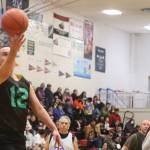 Sitkas Tom Anderson (12) shoots during a game against Kake on Wednesday during an elimination game for the Masters Bracket in this years Gold Medal basketball tournament. Anderson finished the game with 8 points. (Jonson Kuhn / Juneau Empire)
