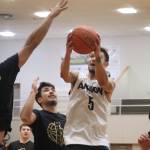 Angoons Aquino Brinson (5) drives the ball in for a layup on Wednesday against Metlakatla for a B bracket elimination game in this years Gold Medal basketball game. Brinson ended the game with a total of 25 points. (Jonson Kuhn / Juneau Empire)