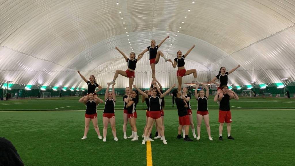 Courtesy Photo / Carlene Nore 
JDHS cheer team competes at this years ASAA State competition in Anchorage at the Alaska Airlines Center.
