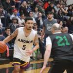 Angoons Aquino Brinson looks for an open pass against Haines on Thursday for an elimination game inside the B bracket for this years Gold Medal basketball tournament. Brinson finished the game with a total of 10 points. (Jonson Kuhn / Juneau Empire)