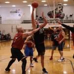 Klukwans Russ Stevens (23) drives to the hoop early in a Masters Bracket game against Juneau. (Ben Hohenstatt / Juneau Empire)