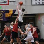 Juneaus Kaleb Tompkins shoots against Hydaburg Thursday night during a Gold Medal B Bracket contest that secure Juneau a spot in the championship game. (Klas Stolpe / For the Juneau Empire)