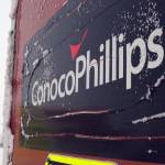 A ConocoPhillips sign covered in ice at the Colville-Delta 5, or as it's more commonly known, CD5, is seen at a drilling site on Alaska's North Slope on Feb. 9, 2016. ConocoPhillips has detailed reasons and remedies following a natural gas leak last year on the North Slope that caused 300 employees to be evacuated. Company officials spoke Thursday, March 23, 2023, during an Alaska Oil and Gas Conservation Commission hearing into the leak at its Alpine field. It said pumping 170 barrels of diesel fuel into a disposal well to prevent freezing caused a component to fail. The leak went unnoticed for days but was corrected. A company official says no one was harmed by the leak. (AP Photo / Mark Thiessen)