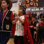 Students dance their way toward exiting the Juneau-Douglas High School: Yadaa.at Kalé gymnasium near the end of a performance held before a Gold Medal Basketball Tournament game between Juneau and Hydaburg. (Ben Hohenstatt / Juneau Empire)