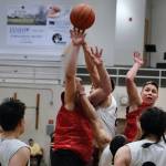 Hydaburgs George Peratrovich tips in teammate Vinnie Edenshaws missed free throw with 0.3 seconds remaining in overtime, forching a second overtime in a win over Angoon during Friday nights elimination game at the Gold Medal Tournament in Juneau. (Klas Stolpe/For the Juneau Empire)