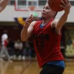 Hydaburgs Vinny Edenshaw runs in for a layup against Juneau in the B bracket championship game in the Gold Medal Basketball Tournament on Saturday. Edenshaw led his team in scoring for a total of 24 points and earned All-Tournament honors, as well. (Jonson Kuhn / Juneau Empire)