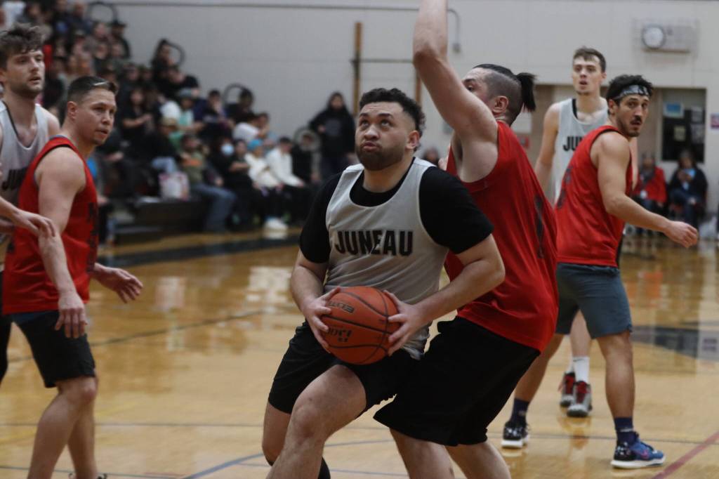 Juneaus Mahina Toutaiolepo drives for a 2 point shot against Hydaburg Saturday night for the Gold Medal Basketball Tournaments B bracket championship game. Toutaiolepo finished the game with 12 points and earned Allstar honors, as well. (Jonson Kuhn / Juneau Empire)