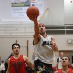 Juneaus Terrence Wheat takes the ball to the basket for 2 points Saturday night against Hydaburg in the B bracket championship game for this years Gold Medal Basketball Tournament at JDHS. Wheat finished the game with 5 points. (Jonson Kuhn / Juneau Empire)