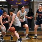Yakutats Trinity Jackson and POWs Michaela Demmert battle for a ball as POWs Tina Steffen, Yakutats Lorena Williams and POWs Lillian Borromeo look on during the Gold Medal Basketball Tournament, Saturday, March 25, at Juneau-Douglas High School: Yadaa.at Kalé. (Klas Stolpe/For the Juneau Empire)