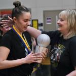 Cassie Williams is congratulated by her mother Ann after winning the Womens Bracket championship and Most Valuable Player honors, Saturday, March 25, during the Gold Medal Basketball Tournament at Juneau-Douglas High School: Yadaa.at Kalé. (Klas Stolpe/For the Juneau Empire)