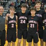 Courtesy Photo / Robert Casperson 
JDHS senior boys with coach Robert Casperson, left to right, Nelson Bodhi, Kai Hargrave, Caden Masdeg, Orion Dybdahl and Joseph Aline, pose for a photo at the ASAA state competition in Anchorage on Saturday before the championship game against Dimond High School. The Crimson Bears would take sixth place overall.